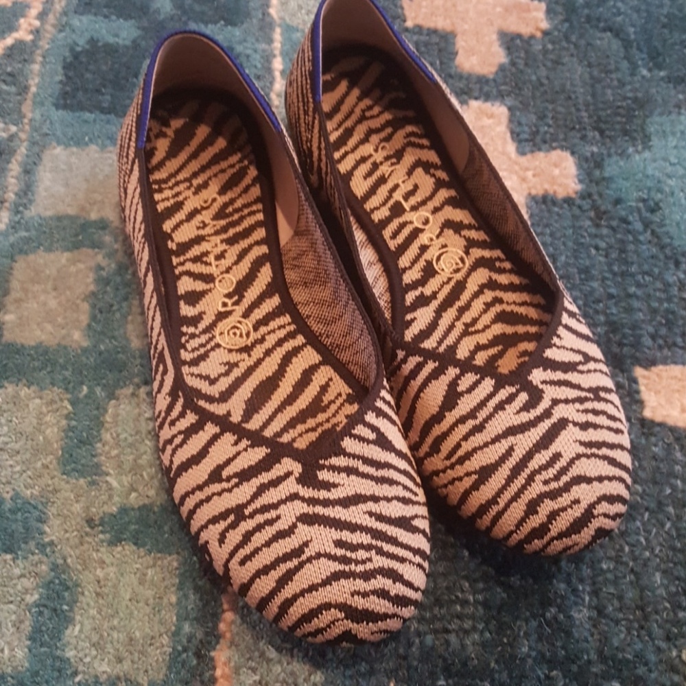 Like new zebra retired Rothy's 9.5